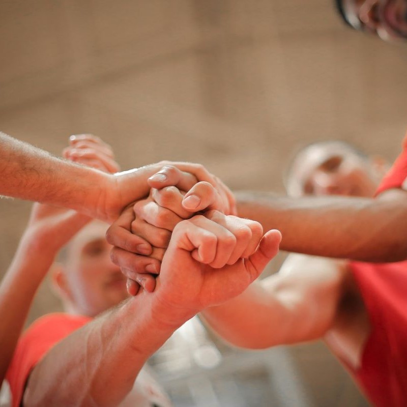 Gruppe von Menschen bei einem Team-Motivationsworkshop